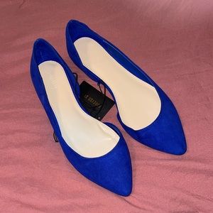 Vibrant blue suede flats.
